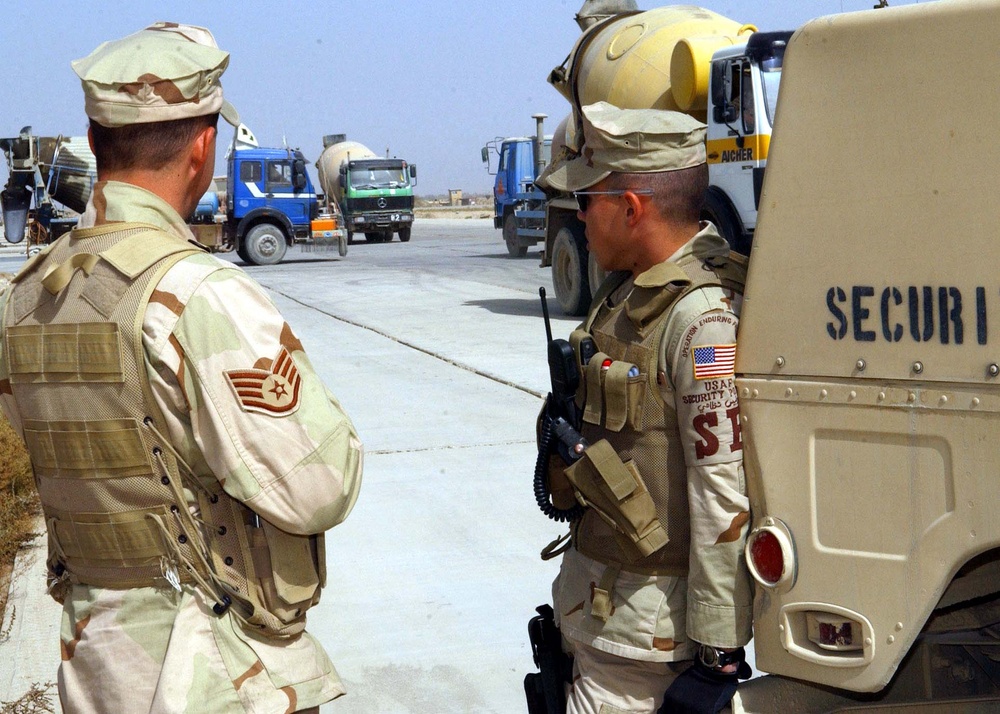 Security personnel conducting a perimeter patrol